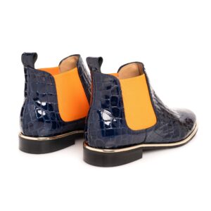 navy patent Chelsea boot with orange elastic