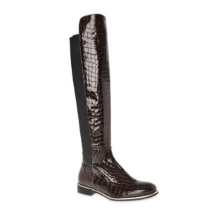 Flat knee-high chocolate croc leather boot with black stretch back panel, full-length inner zip, and gold rim detail — Nicola Sexton AW25.