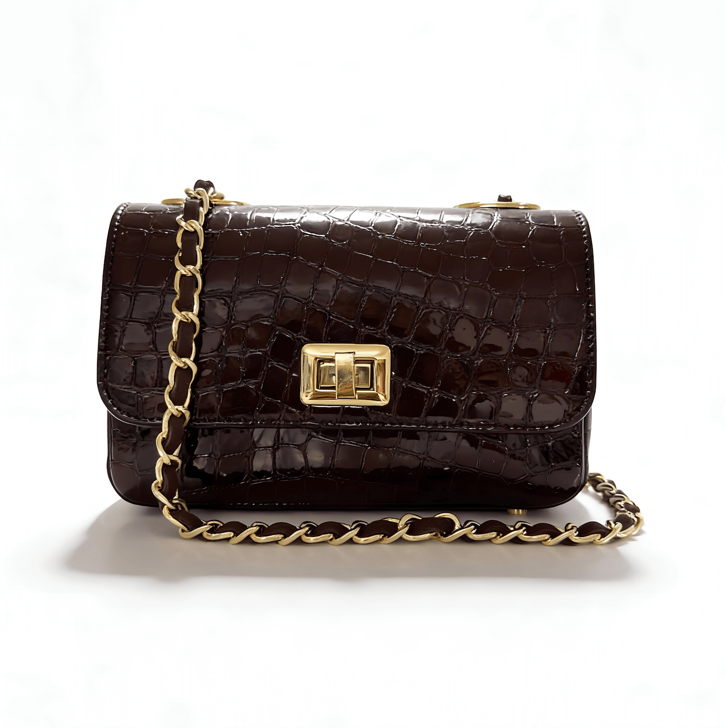 Chocolate brown croc-embossed leather crossbody handbag with gold chain strap and turn-lock fastening, handcrafted in Italy – Nicola Sexton Celia handbag
